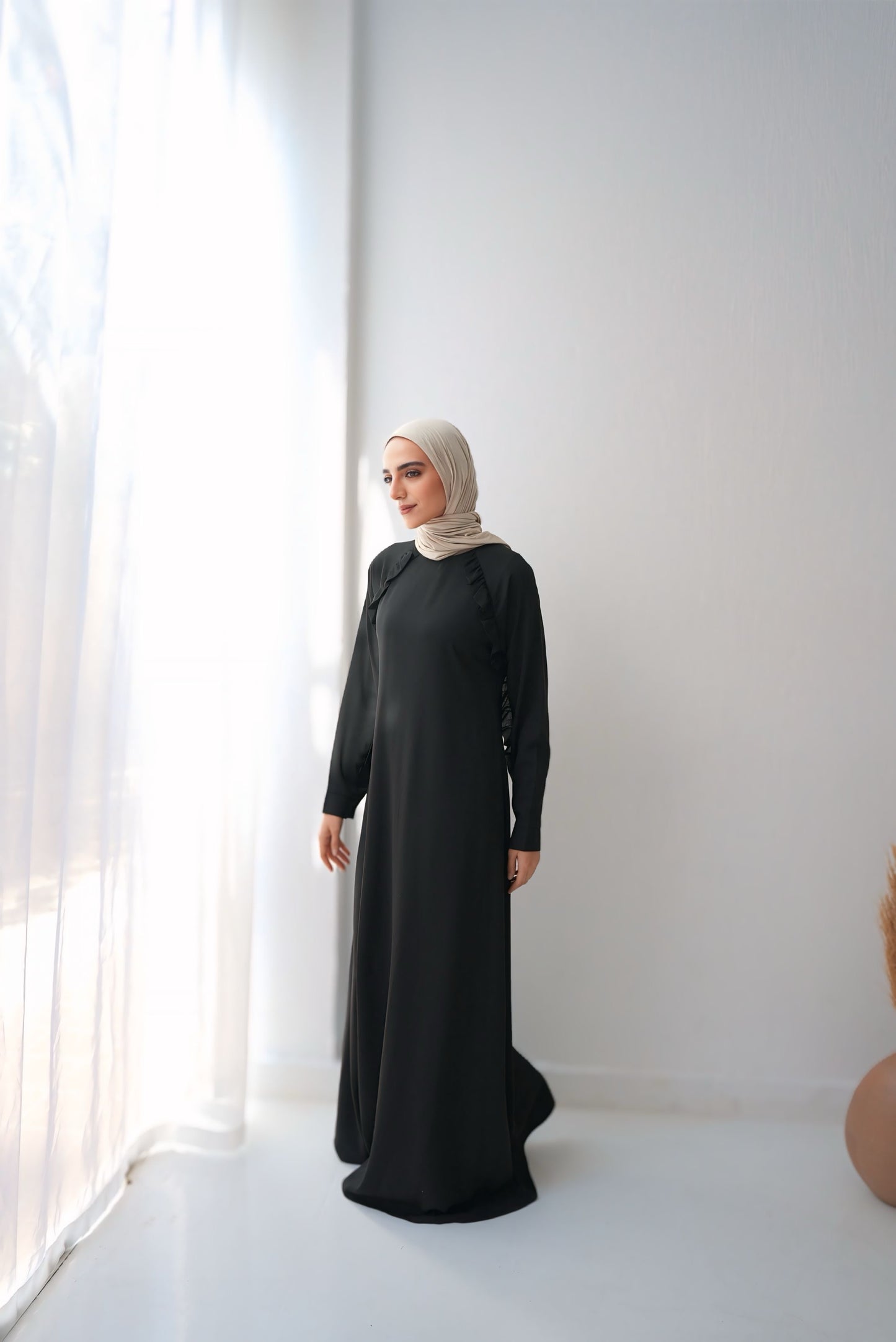 Rony Soft crepe abaya with delicate ruffles on the chest and sleeves Code 409