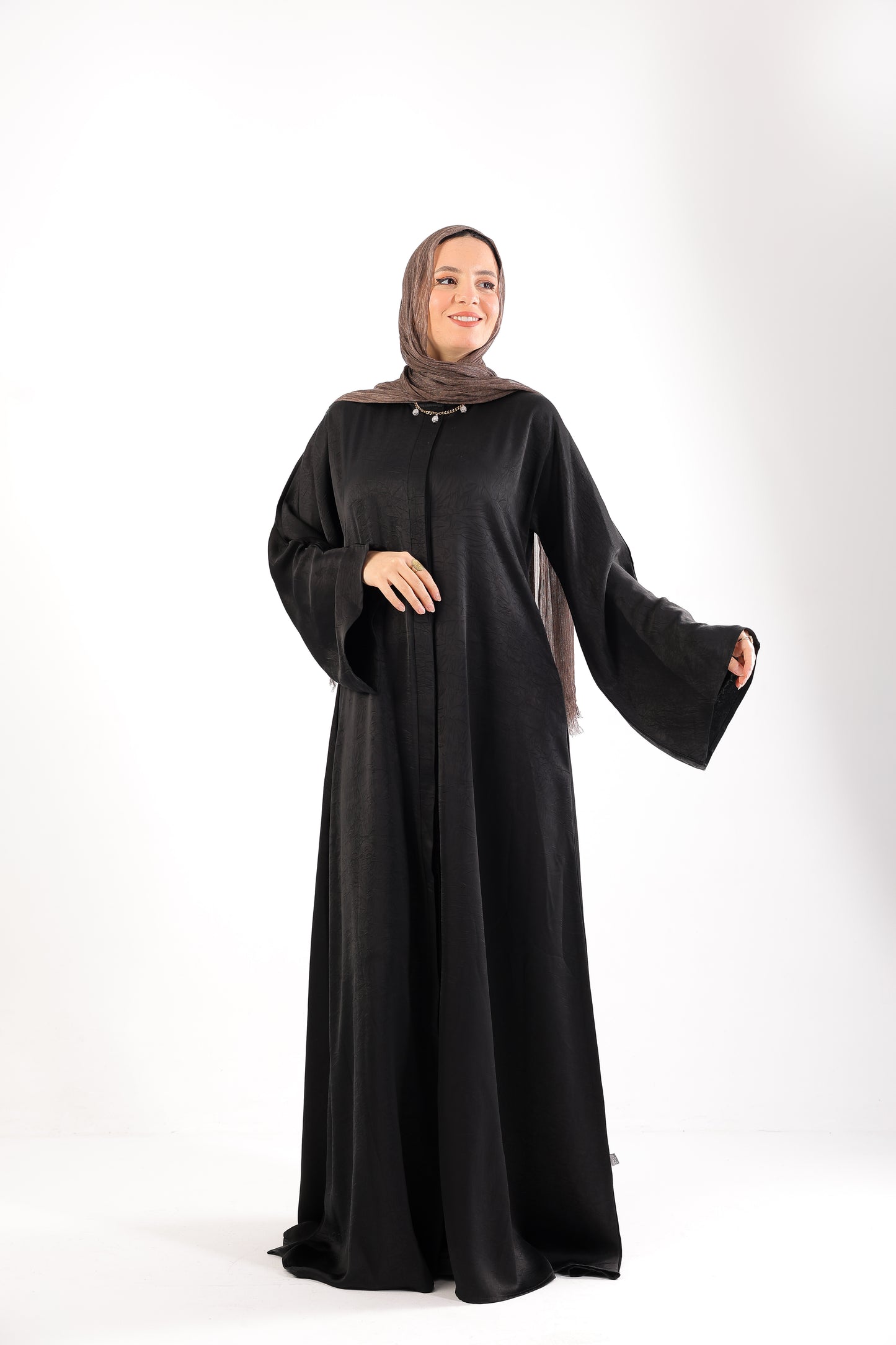 our Jacquard Silk Abaya with hidden buttons and Pockets 
Code 800B