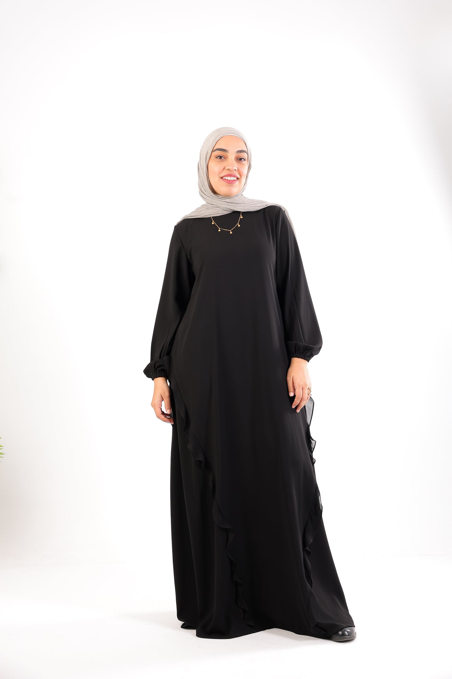 A chic, feminine abaya designed with soft ruffle details Code 504