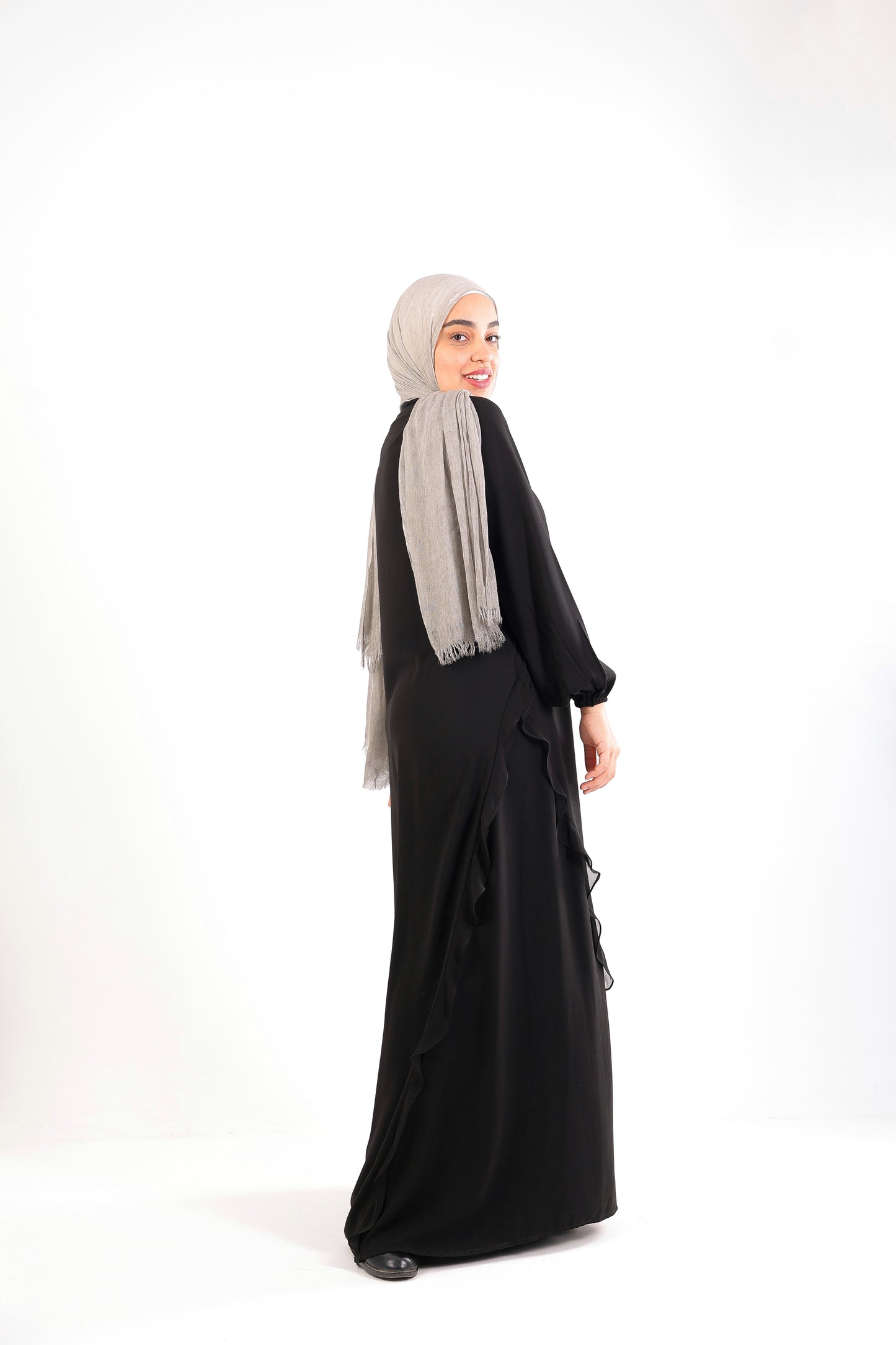 A chic, feminine abaya designed with soft ruffle details Code 504