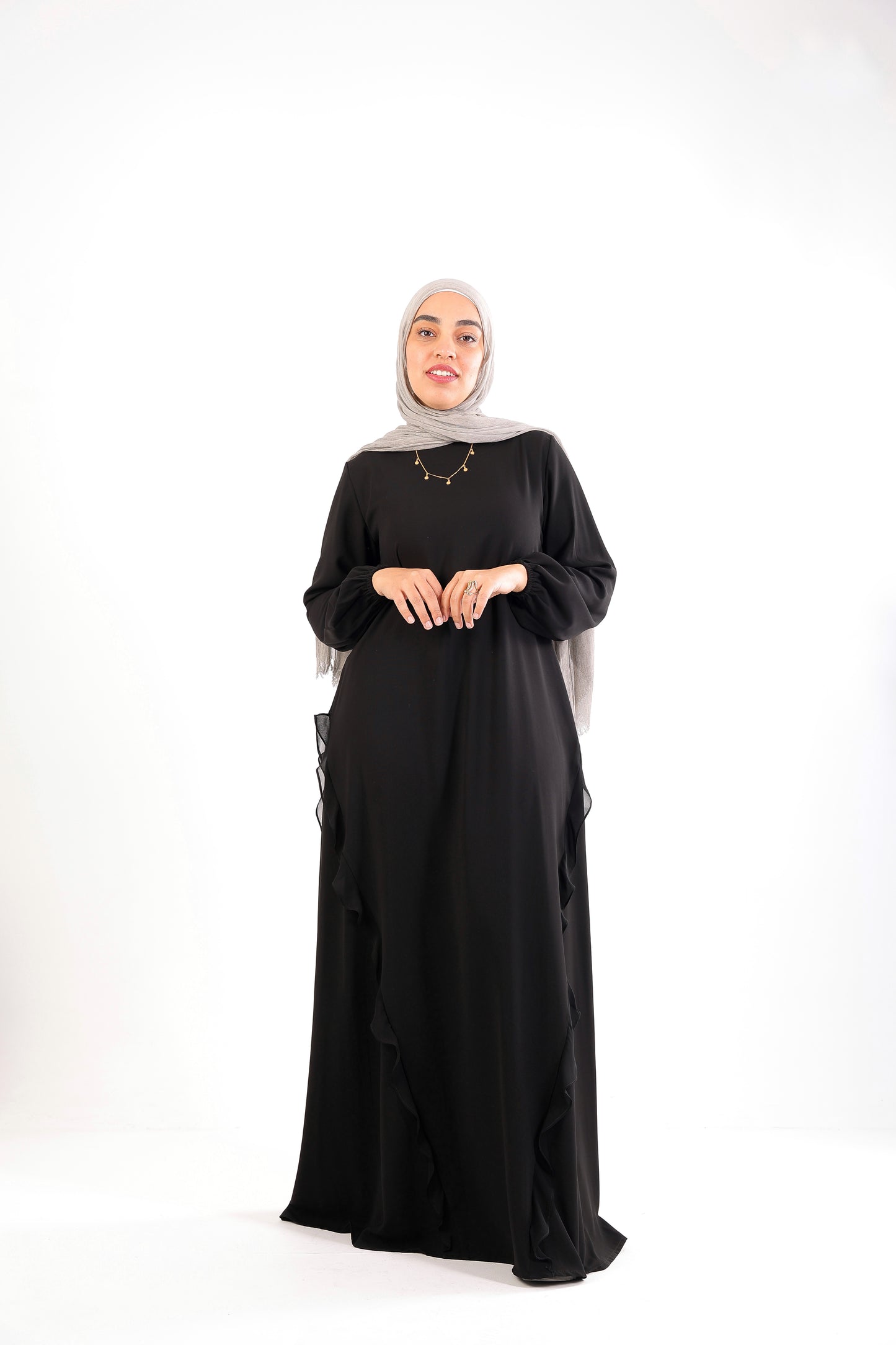 A chic, feminine abaya designed with soft ruffle details Code 504